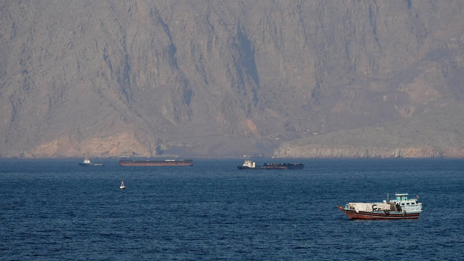 FILE PHOTO: Ships and tankers in the Strait of Hormuz off the coast of Musandam, Oman, April 18, 2026. REUTERS/Stringer//File Photo/File Photo