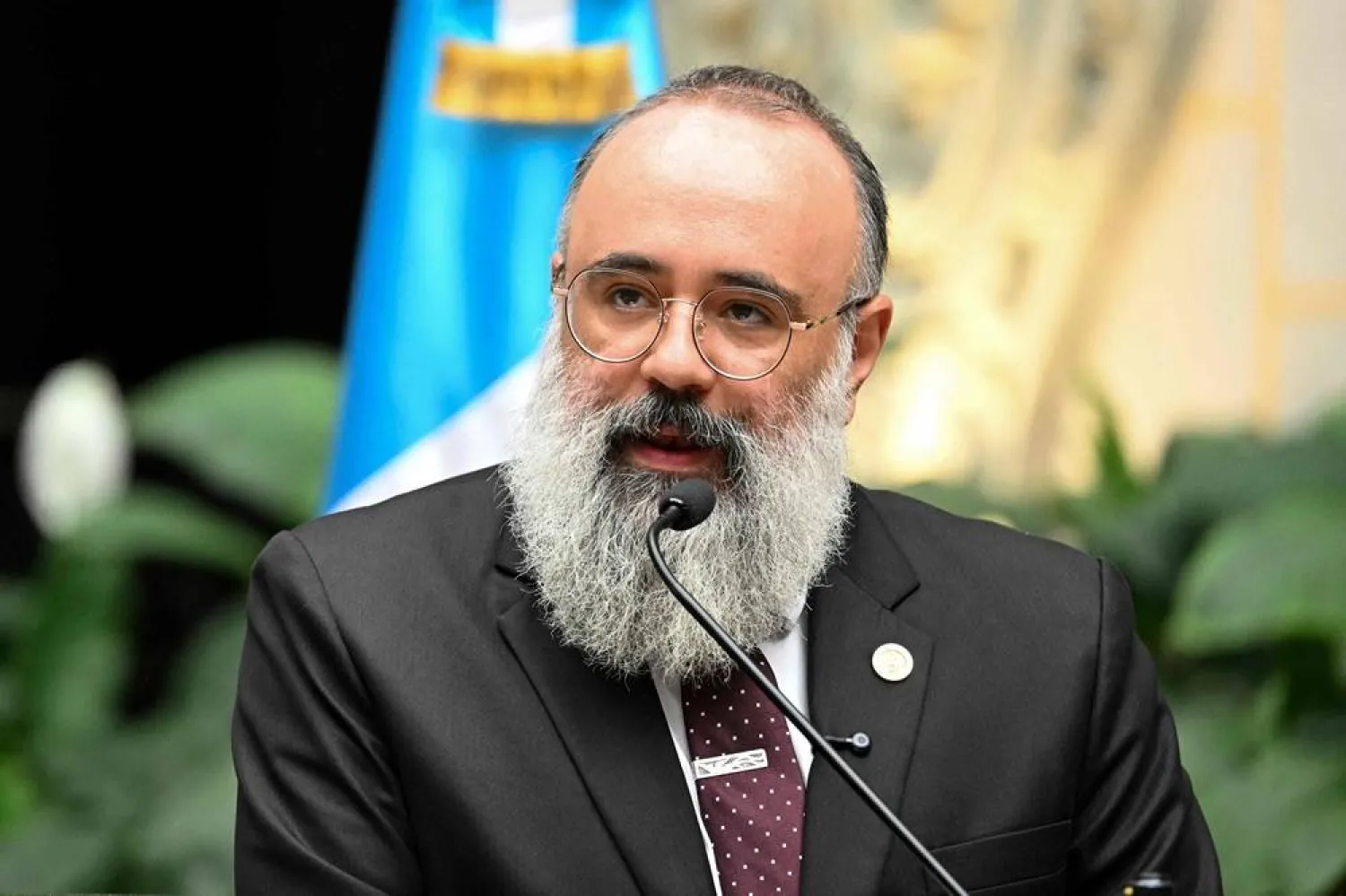 Guatemala's Minister of Culture and Sports Luis Mendez speaks during a press conference on new findings in the decipherment of hieroglyphs on Maya murals at the Xultun archaeological site, at the National Palace of Culture in Guatemala City on July 13, 2026. (AFP) 