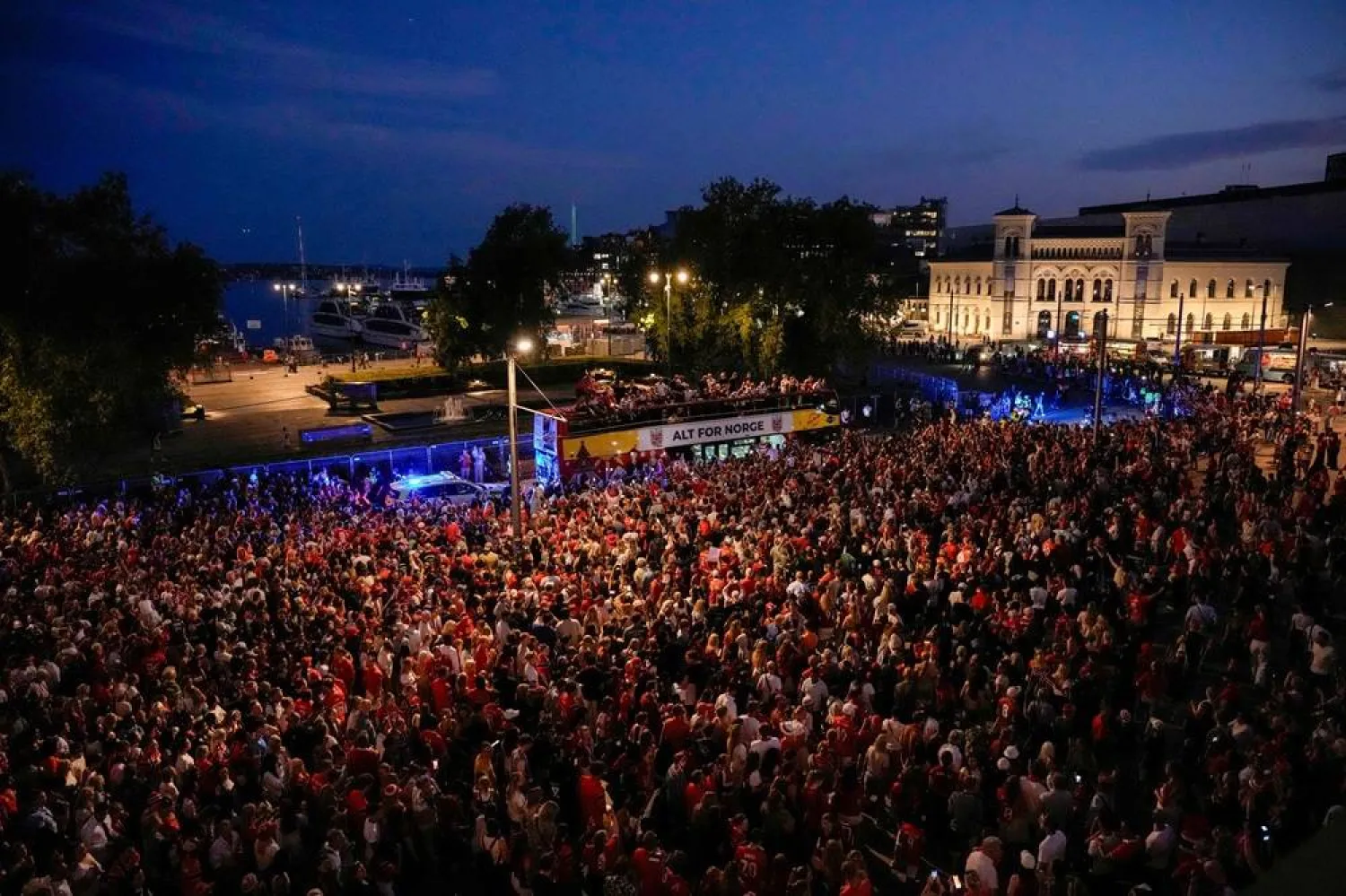 Supporters wave for Norway's national football team at Radhusplassen in Oslo after their return to Norway from the US on July 13, 2026. (AFP)