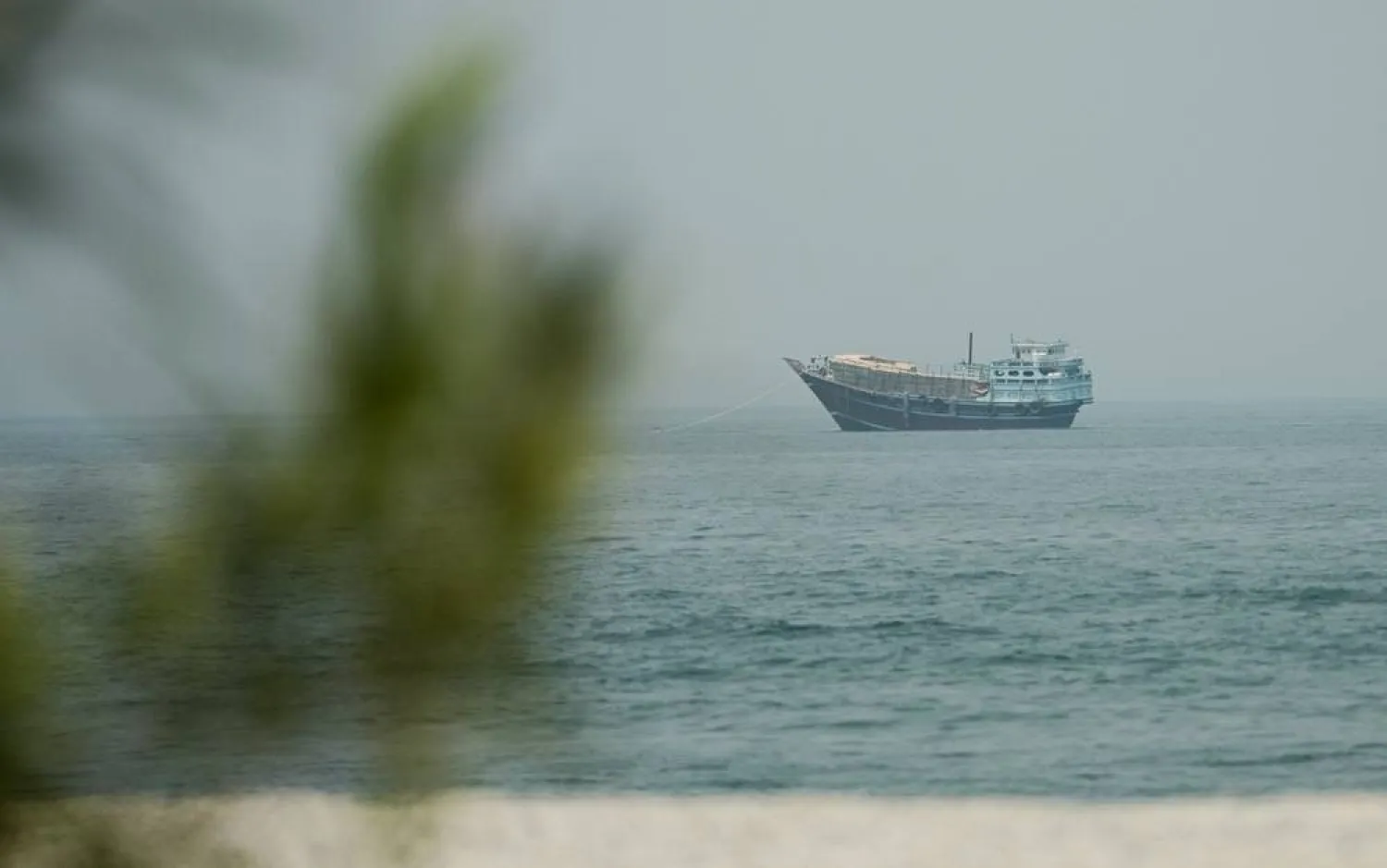  A vessel at the Strait of Hormuz, as seen from Musandam,Oman, July 14, 2026. (Reuters)