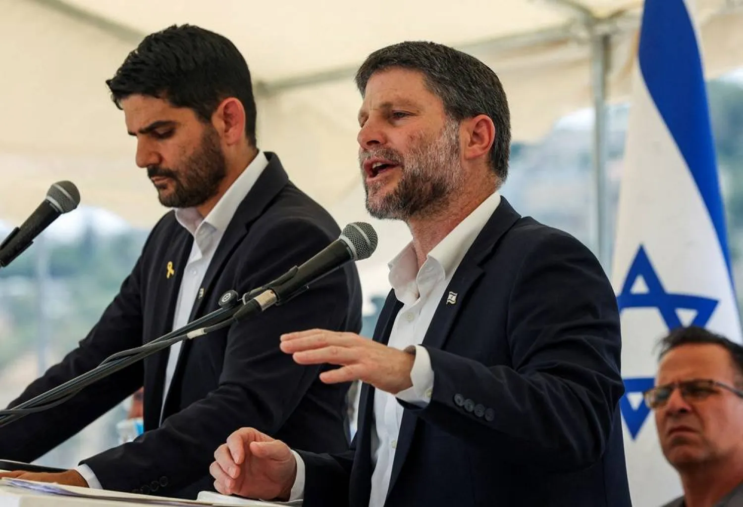 Israeli Finance Minister Bezalel Smotrich speaks at a press conference regarding settlements expansion for the long-frozen E1 settlement, that would split East Jerusalem from the occupied West Bank, near the Israeli settlement of Maale Adumim in the Israeli-occupied West Bank, August 14, 2025. (Reuters)