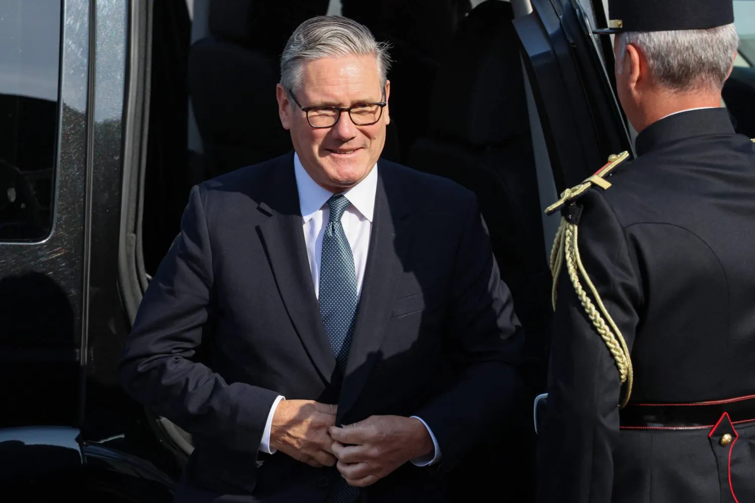 Britain's Prime Minister Keir Starmer arrives for the annual Bastille Day military parade on the Champs-Elysees Avenue in Paris on July 14, 2026. (AFP)