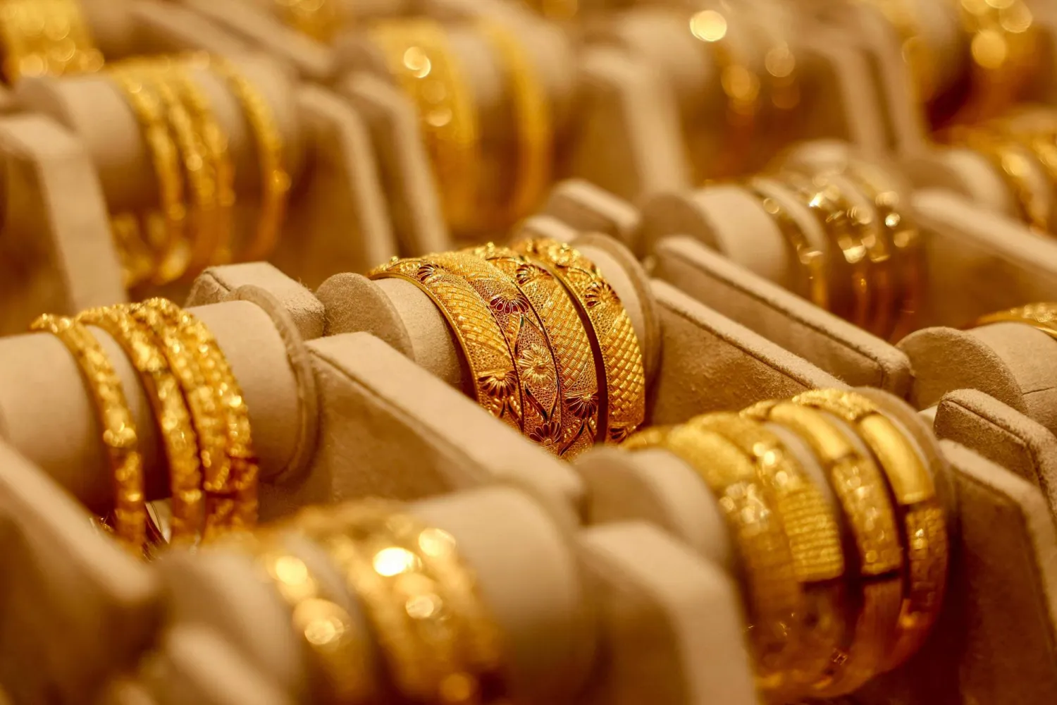 Gold bangles on display at a jewelry shop in Varanasi, India (AFP)