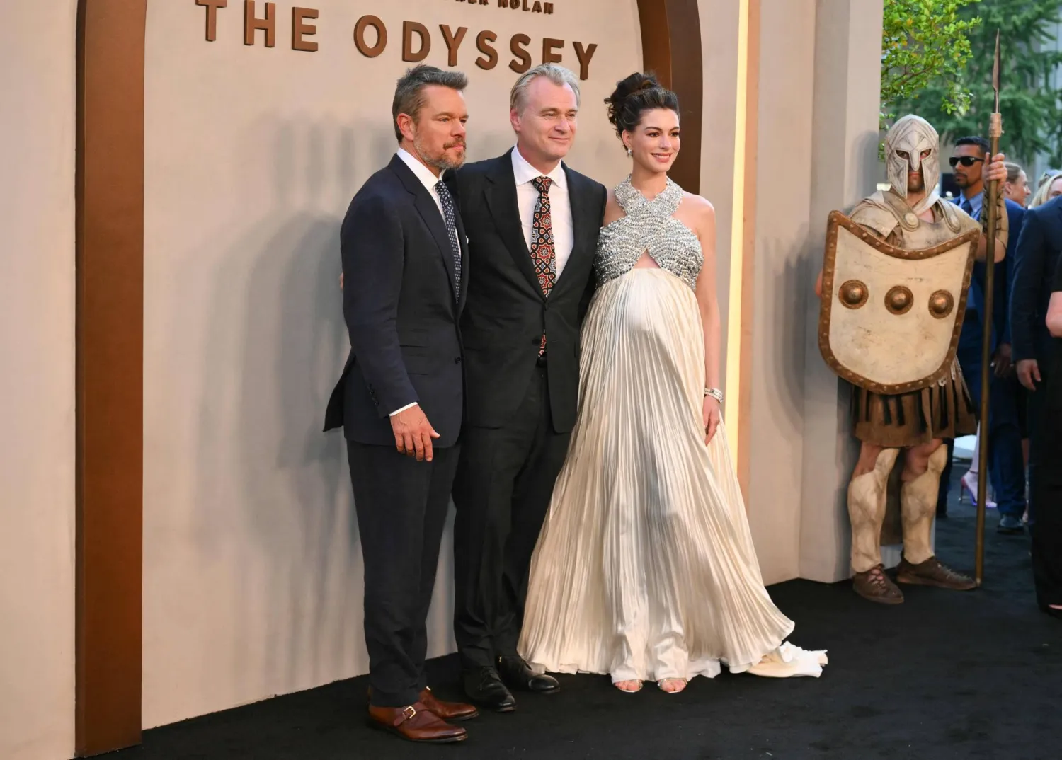  US actor Matt Damon (L), British-US director Christopher Nolan (C) and US actress Anne Hathaway (R) attend "The Odyssey" premiere at the AMC Lincoln Square in New York on July 14, 2026. (AFP) 