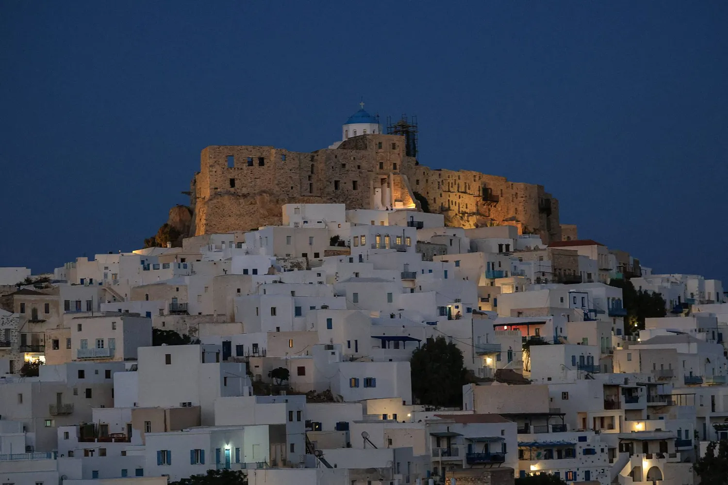 The castle and buildings in the main tourist town on the island, which declared a drought emergency, in Chora, Astypalaia, Greece, July 13, 2026. REUTERS/Louisa Gouliamaki