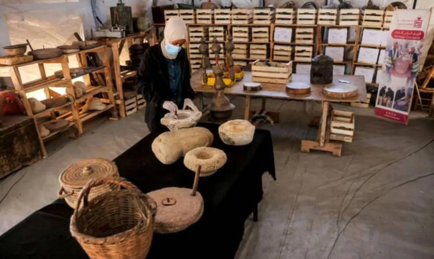 Palestinian curators working to restore ancient artifacts amid the ruins of war-devastated Gaza. (AFP)

