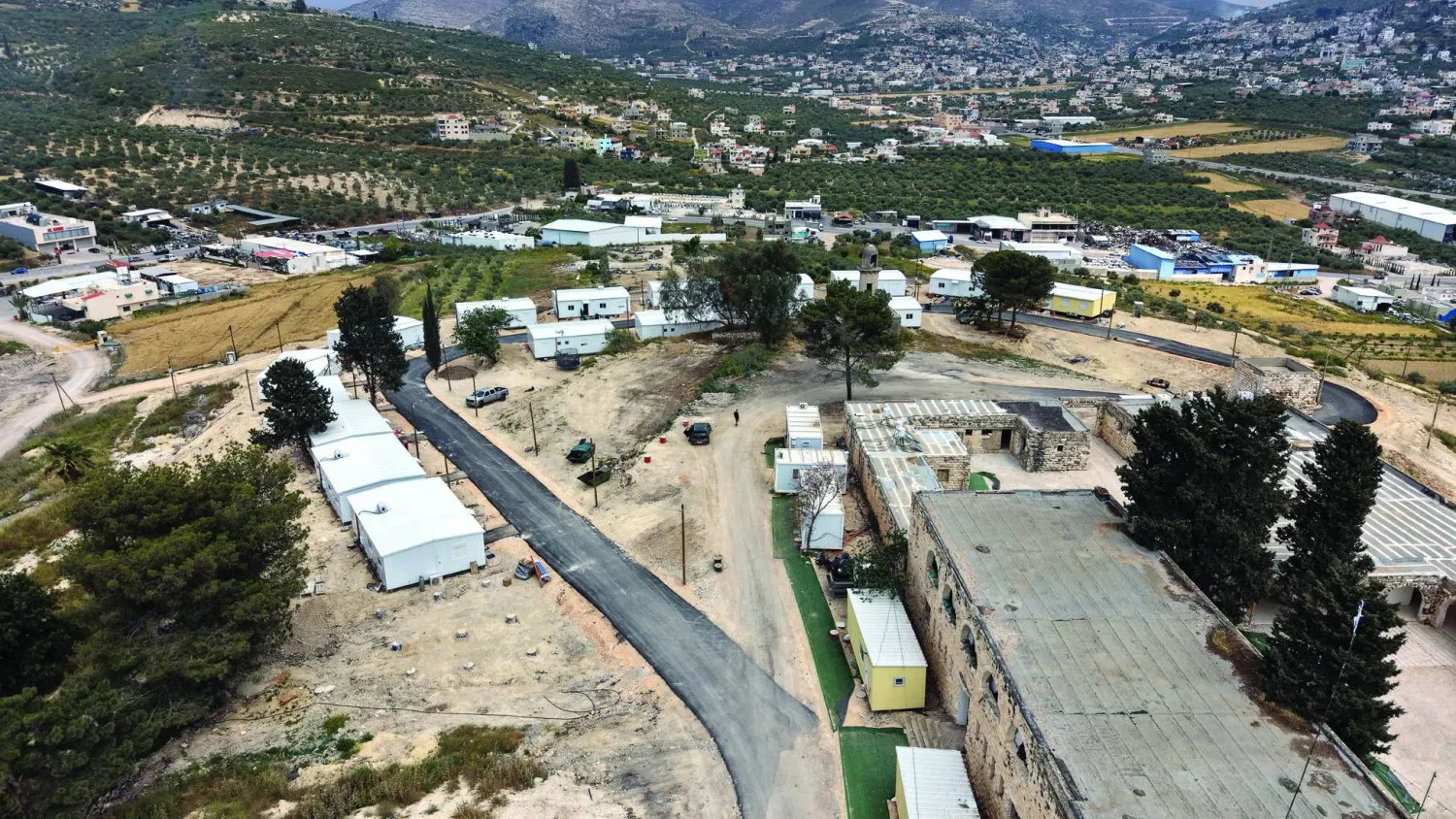 06 May 2026, Palestinian Territories, Sa-Nur: An aerial view shows rebuilt structures at the Sa-Nur settlement south of Jenin in the Israeli-occupied West Bank. Photo: Gil Cohen-Magen/dpa