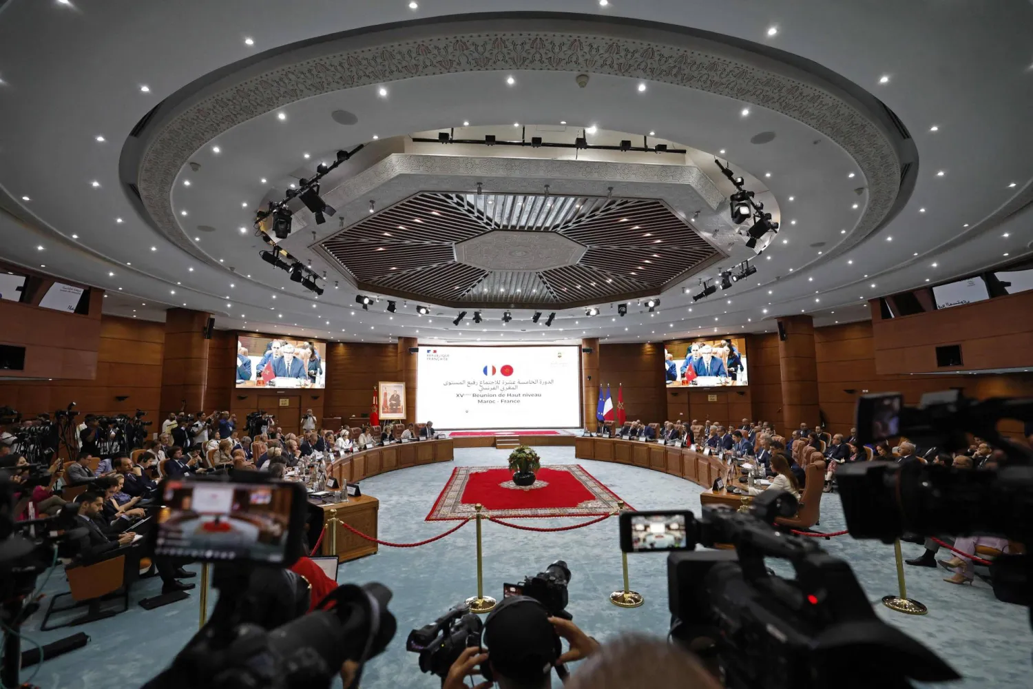 France's Prime Minister Sébastien Lecornu along with his delegation (L) attend a plenary session with the Moroccan lawmakers in Rabat on July 16, 2026. (Photo by Abdel Majid BZIOUAT / AFP)