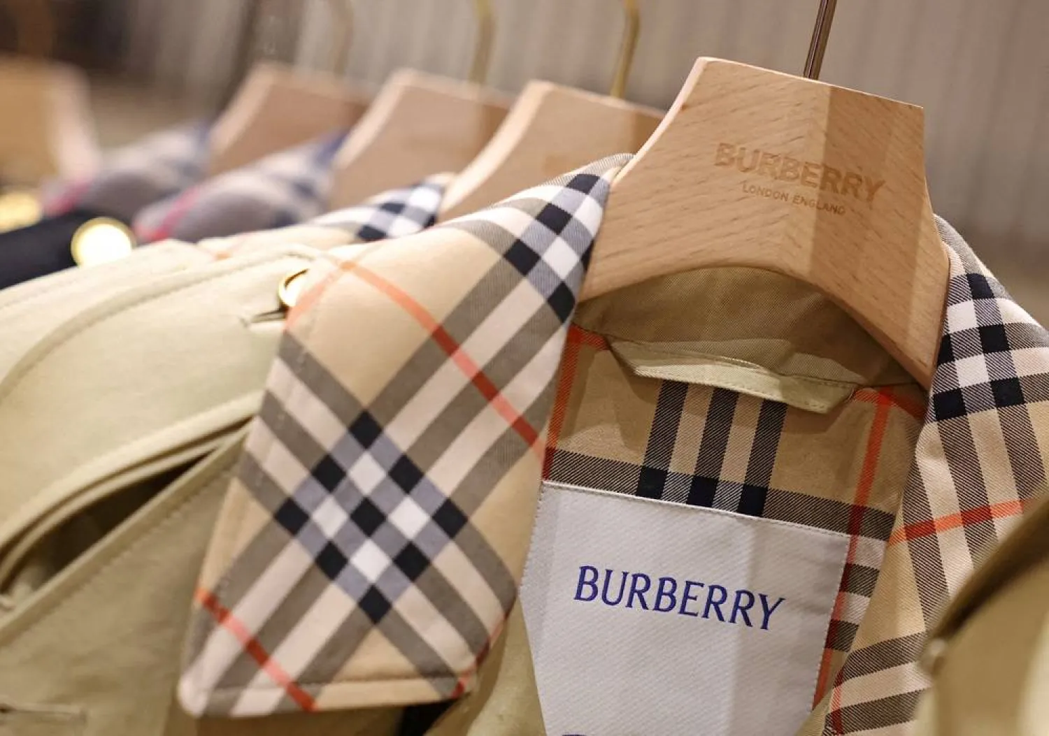 A Burberry trench coat with the Burberry label is displayed at the Burberry flagship store in Regent Street, London, Britain, September 8, 2025. (Reuters)