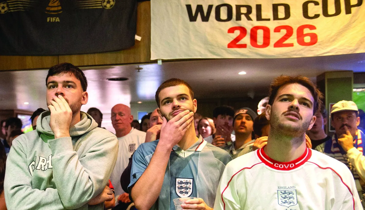 English football supporters react after Argentina defeated England in the FIFA World Cup 2026 semi-finals match, in Sydney, Australia, July 16, 2026. REUTERS/Jeremy Piper