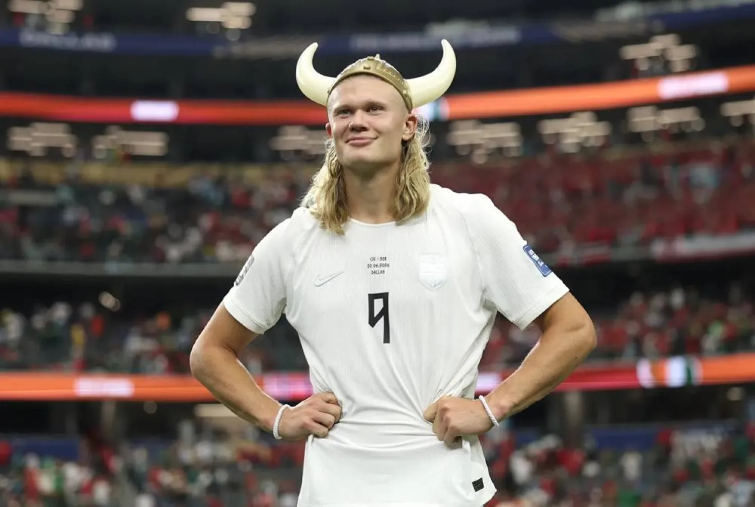 Erling Haaland wears a viking helmet after beating the Ivory Coast at the World Cup. (Getty Images)