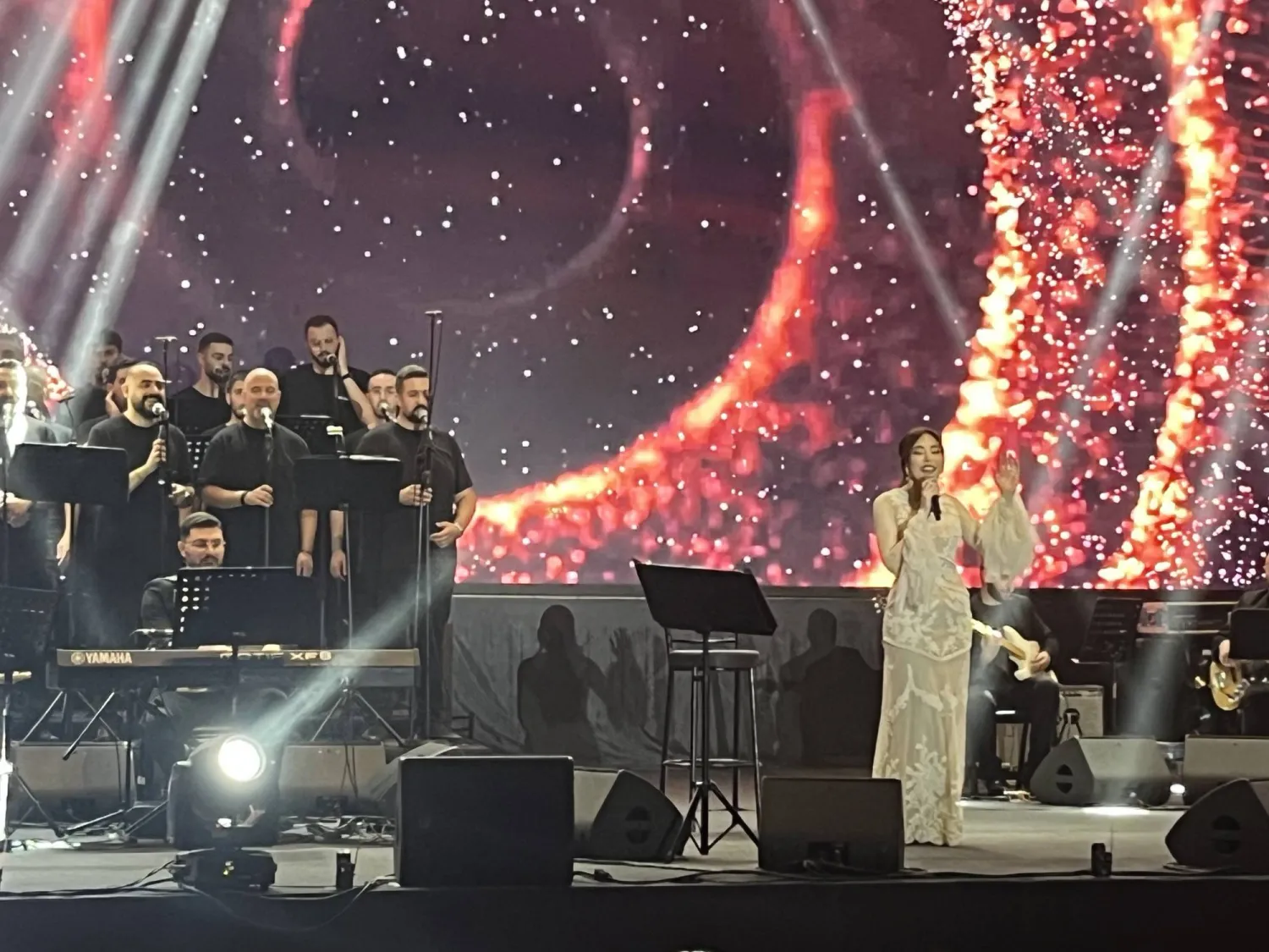 The crowd erupted in applause as Nehme walked onto the stage with her band, dressed in white. She opened with “Ahwe" (Asharq Al-Awsat)