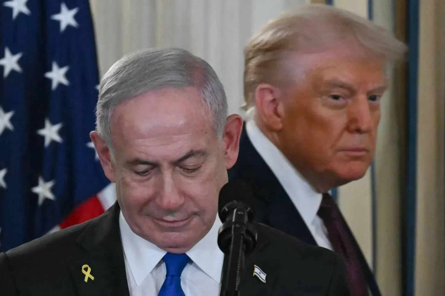 US President Donald Trump and Israeli Prime Minister Benjamin Netanyahu (L) arrive for a press conference in the State Dining Room of the White House in Washington, DC on 29 September 2025. (AFP)