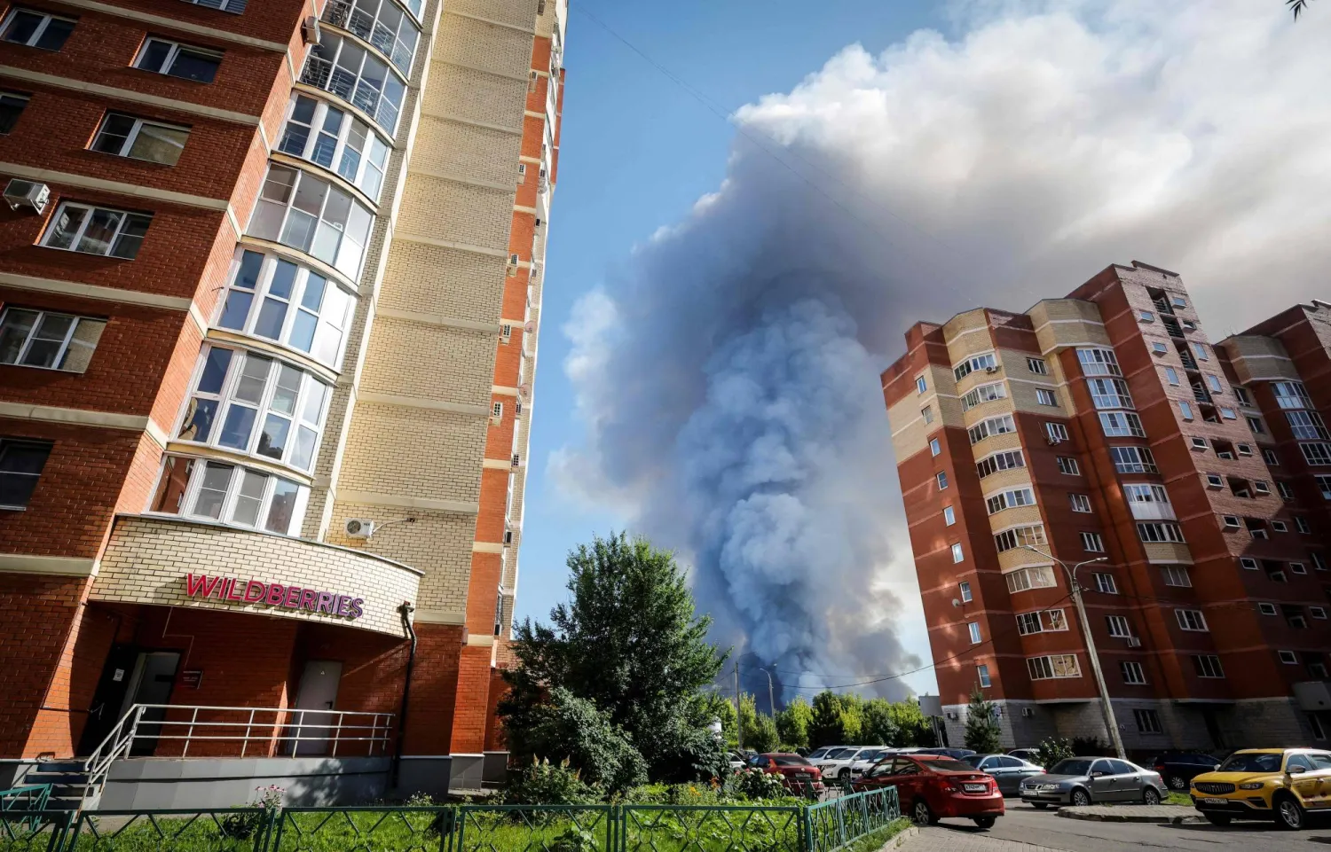 This photograph shows smoke rising from a fire at the Russian e-commerce firm Wildberries' logistics complexes in the town of Elektrostal outside Moscow on July 18, 2026. (Photo by TATYANA MAKEYEVA / AFP)