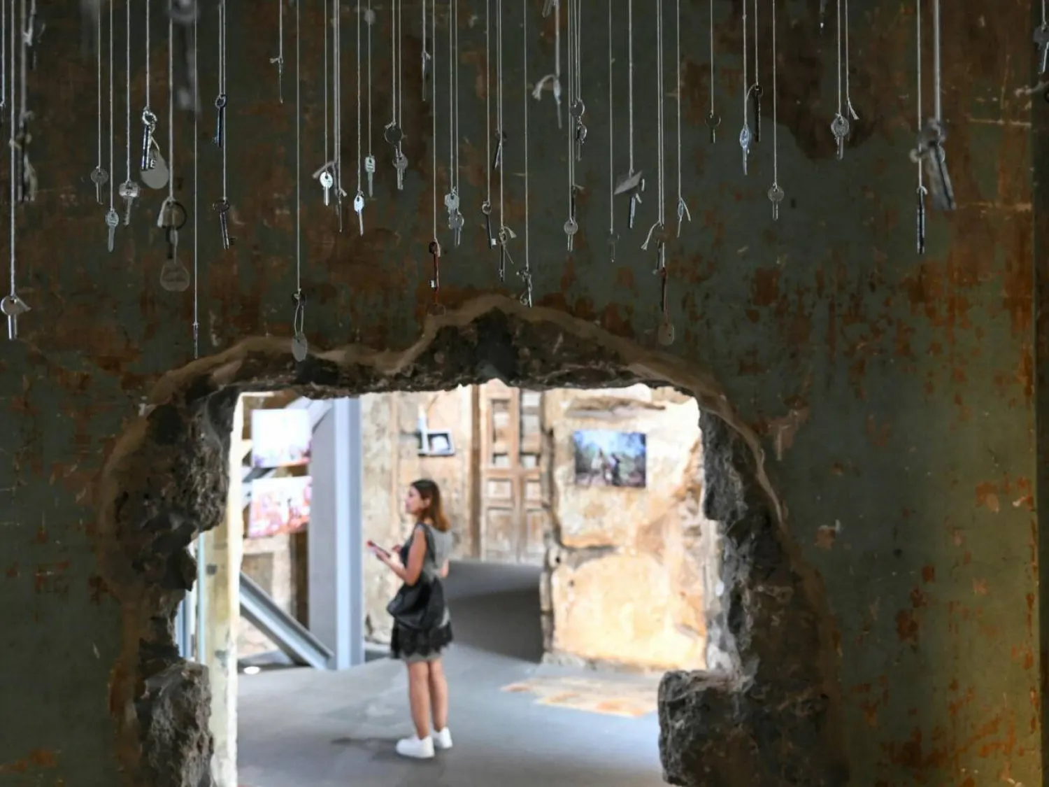 An installation featuring keys from destroyed houses in south Lebanon forms part of an ongoing exhibition at a Beirut museum. JOSEPH EID / AFP
