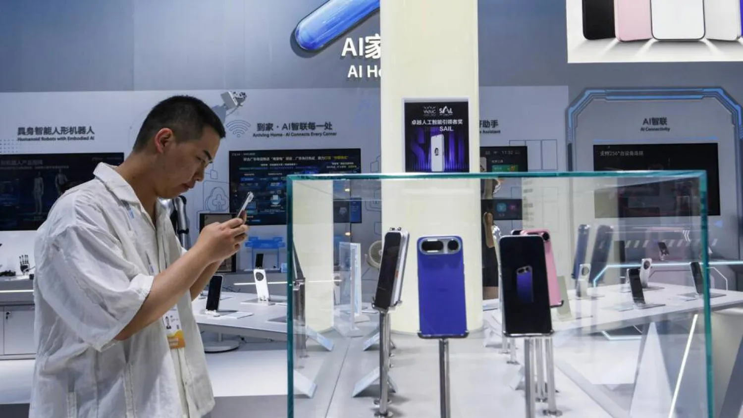Chinese firms showed off phones that would be run by artificial intelligence. CN-STR/AFP
