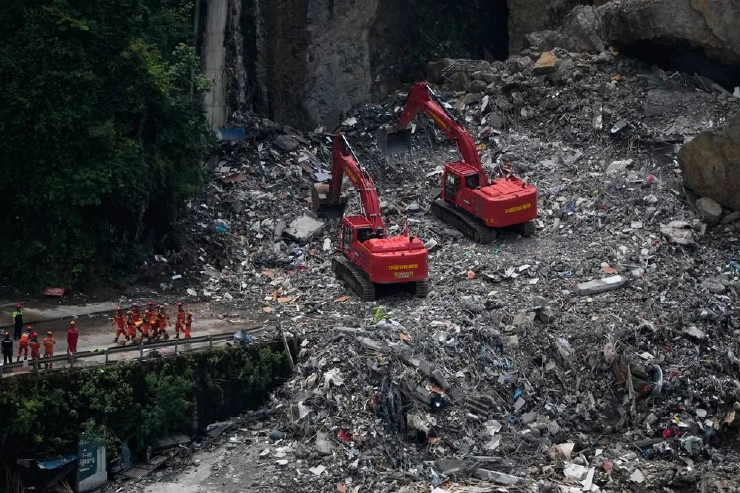 Rescuers work at the scene of a landslide in Pengshui County, southwestern China's Chongqing on Sunday, July 19, 2026. (AP)