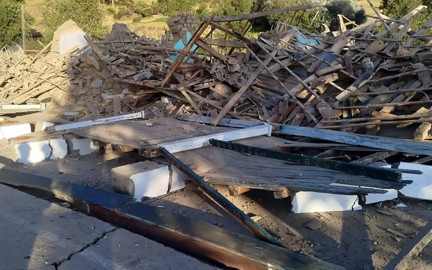 This handout picture released by Peru's Defense Ministry shows a collapsed house on the outskirts of Huancayo, about 300 km east of Lima, on July 19, 2026, following a 5.5 magnitude quake. (Handout / Peruvian Ministry of Defense / AFP) 