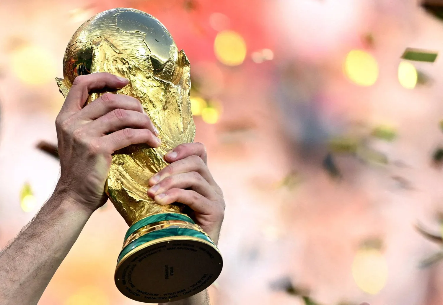 Football - FIFA World Cup 2026 - Final - Spain v Argentina - New York/New Jersey Stadium, East Rutherford, New Jersey, US - July 19, 2026 Spain's Aymeric Laporte lifts the World Cup trophy as he celebrates winning the World Cup. (Reuters)
