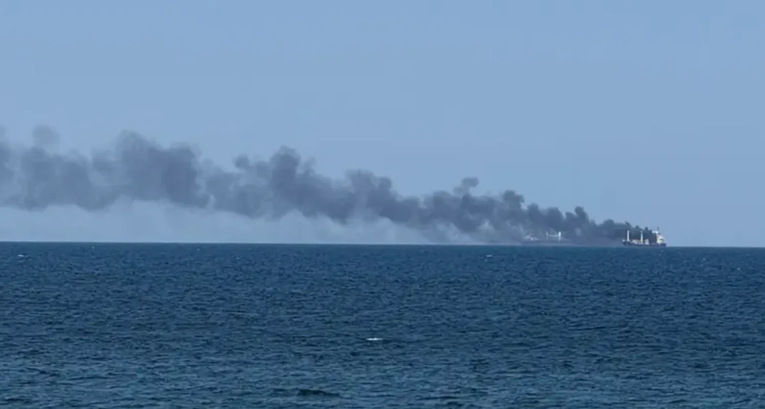 Smoke rises from a civilian vessel on fire, amid Russia's attack on Ukraine, in Odesa, Ukraine July 19, 2026.Picture taken with a mobile phone. (Reuters)
