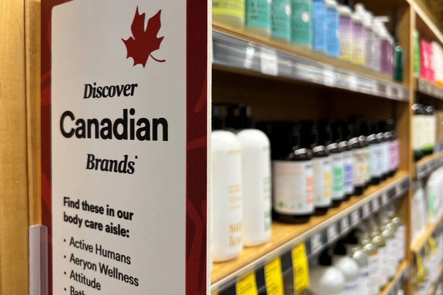 A sign invites customers to choose Canadian products in a personal hygiene aisle at a Whole Foods store in Vancouver, British Columbia, Canada July 20, 2026. REUTERS/Chris Helgren