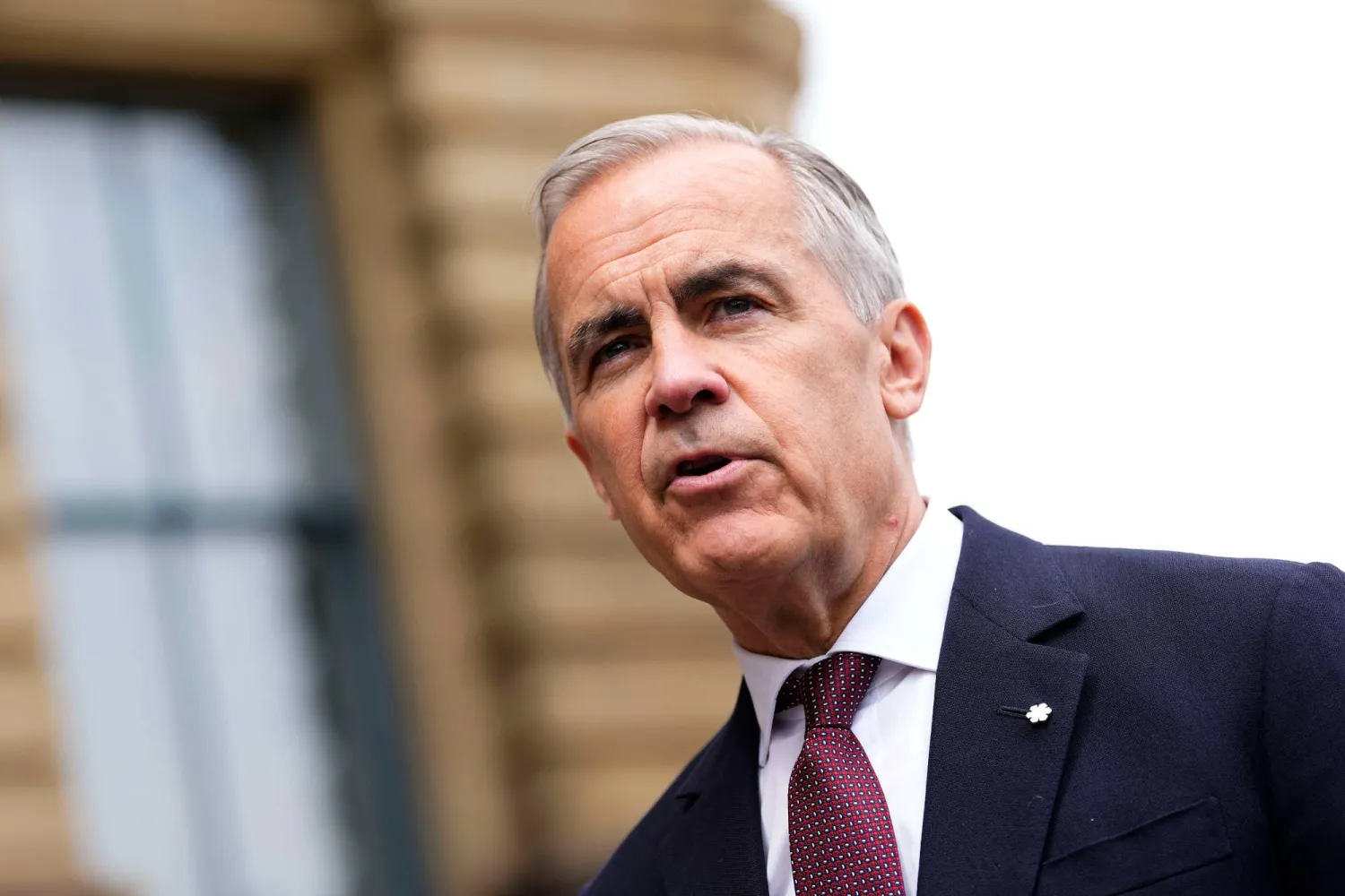  Prime Minister Mark Carney makes a statement outside the Office of the Prime Minister and Privy Council in Ottawa, on Tuesday, July 21, 2026. (Justin Tang/The Canadian Press via AP) 