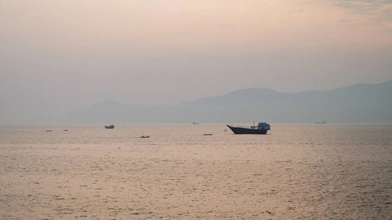 Vessels at the Strait of Hormuz, as seen from Musandam, Oman, July 21, 2026. (Reuters) 