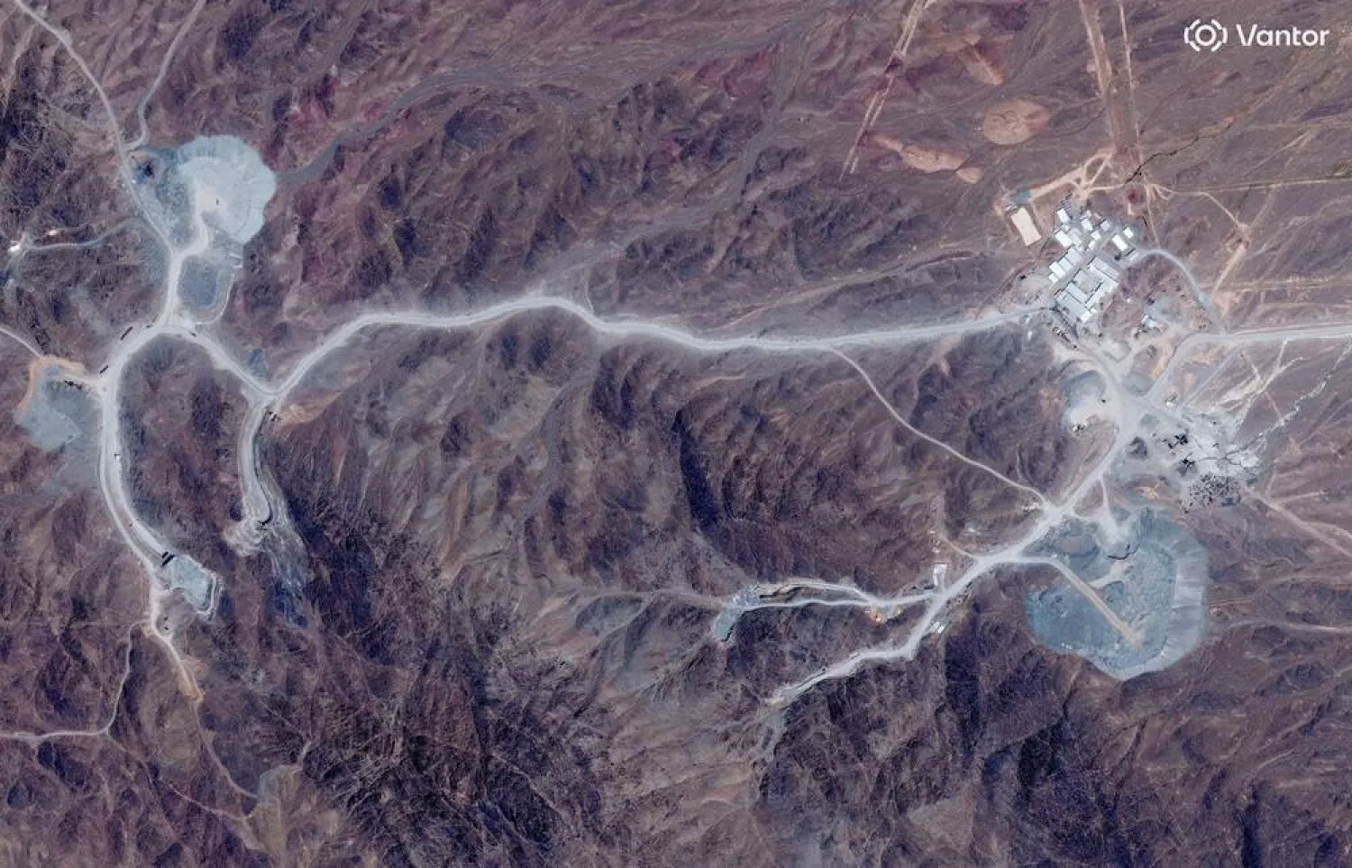 A satellite view shows tunnel entrances at Pickaxe Mountain, of the Natanz nuclear facility, near Natanz, Iran, June 30, 2026. (Vantor/Handout via Reuters)