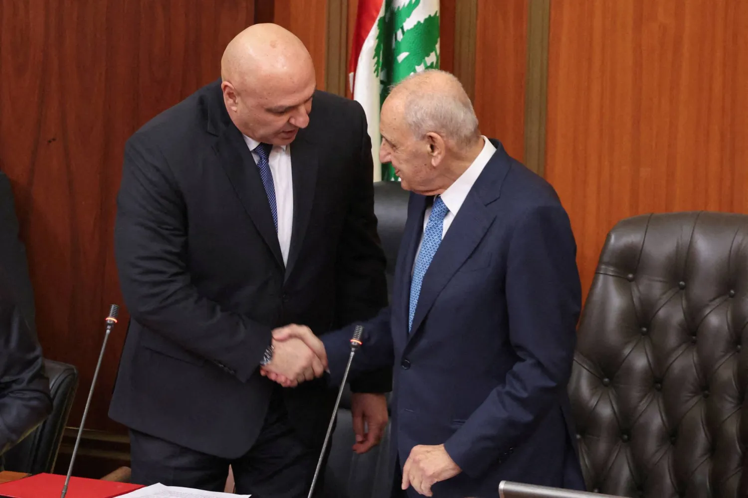 Lebanese Parliament Speaker Nabih Berri shakes hands with Lebanon's army chief Joseph Aoun after he is elected as the country's President at the parliament building in Beirut, Lebanon, January 9, 2025. (Reuters)