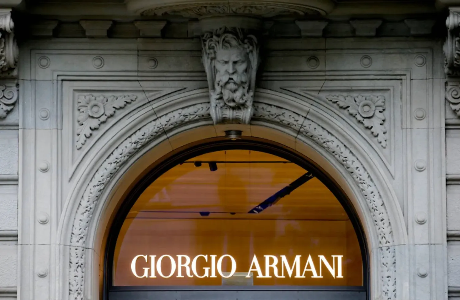 FILE PHOTO: The logo of Italian fashion company Giorgio Armani is seen at a shop in Zurich, Switzerland July 8, 2021. REUTERS/Arnd Wiegmann/File Photo
