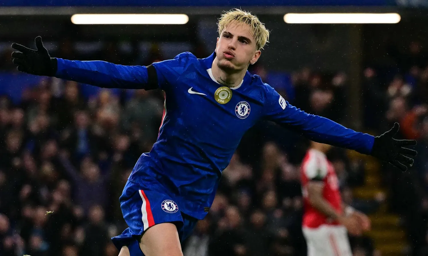 (FILES) Chelsea's Argentinian midfielder #49 Alejandro Garnacho celebrates scoring the team's second goal during the English League Cup semi-final first leg football match between Chelsea and Arsenal at Stamford Bridge, in London on January 14, 2026. (Photo by Ben STANSALL / AFP)
