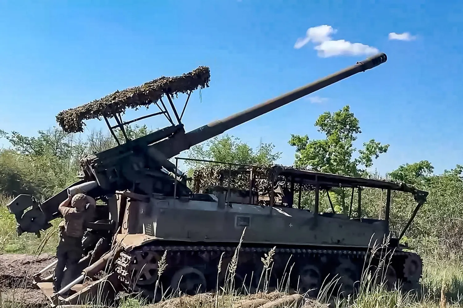 A still image taken from a handout video provided by the Russian Defense Ministry press service on 23 July 2026 shows a Russian serviceman preparing a self-propelled gun Giatsint-S for firing at an undisclosed location in Ukraine. EPA/RUSSIAN DEFENCE MINISTRY 