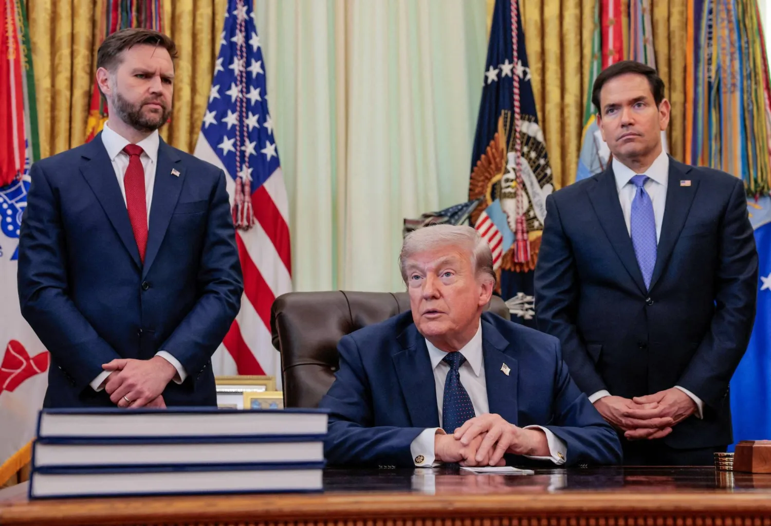 US President Donald Trump delivers remarks in the Oval Office alongside Vice President JD Vance and Secretary of State Marco Rubio at the White House on April 23. (Reuters) 