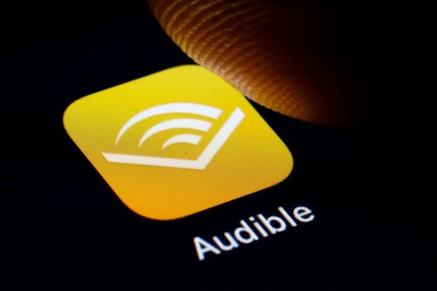 In this photo illustration, the logo of Amazon Audible is displayed on a smartphone. (Getty Images)