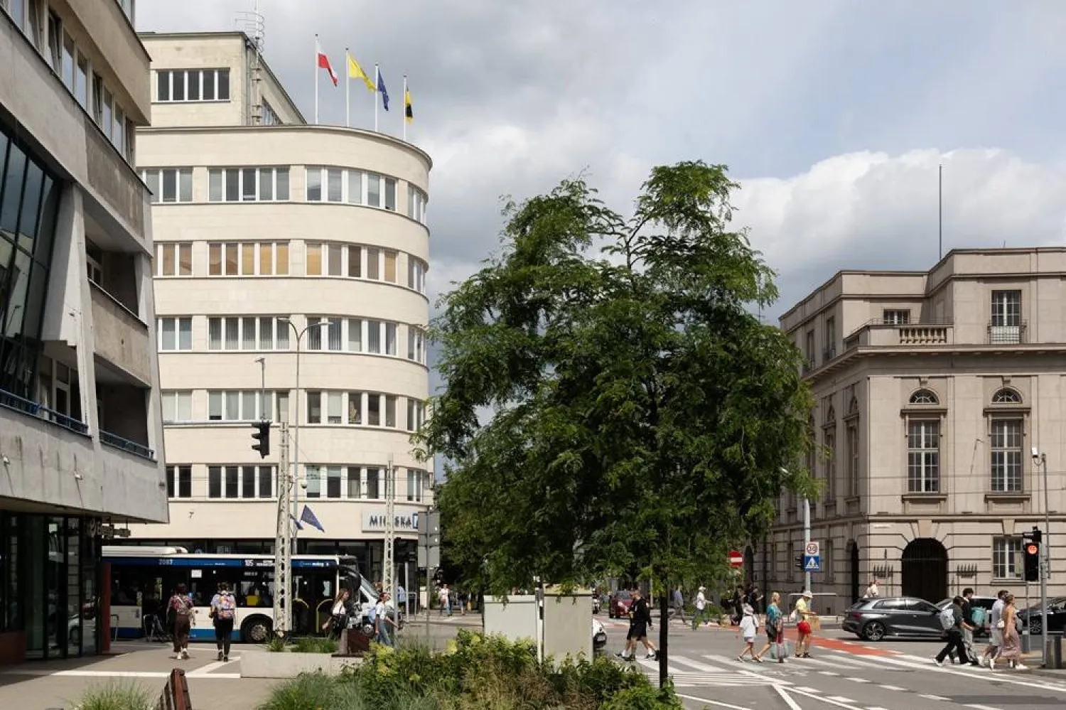 People walk past the former ZUS (Social Insurance Institution) building, a building on the Gdynia Modernism Trail, at the intersection of 10 Lutego Street and 3 Maja Street in Gdynia, Poland, July 25, 2026. (Reuters)