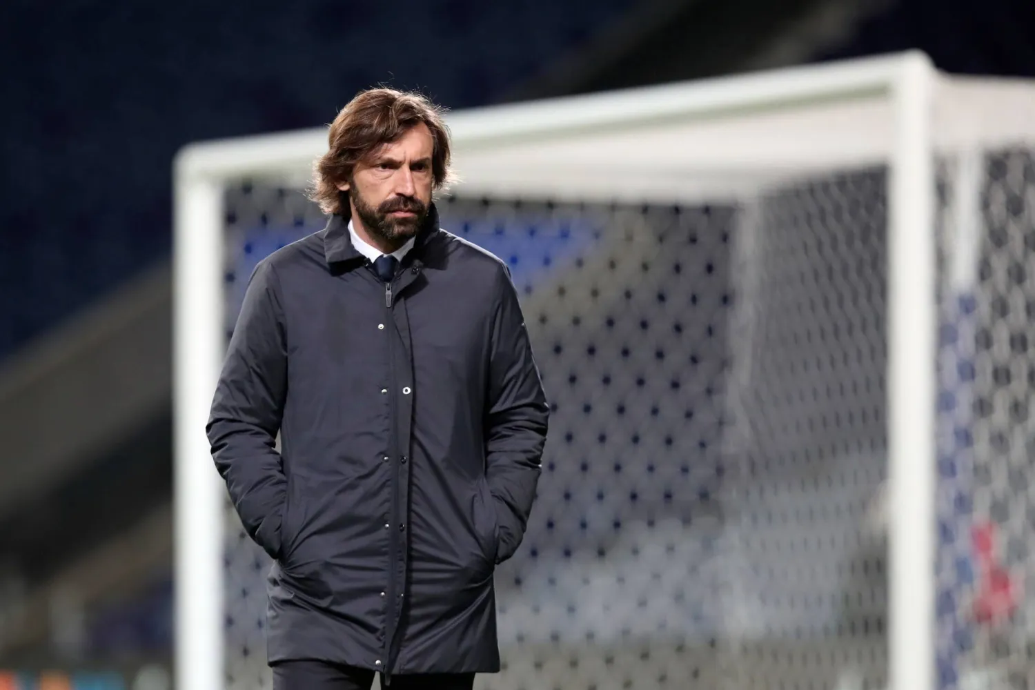 FILE - Juventus' head coach Andrea Pirlo stands on the pitch during warmup before the Champions League round of 16, first leg, soccer match between FC Porto and Juventus in Porto, Portugal, on Feb. 17, 2021. (AP Photo/Luis Vieira, File)