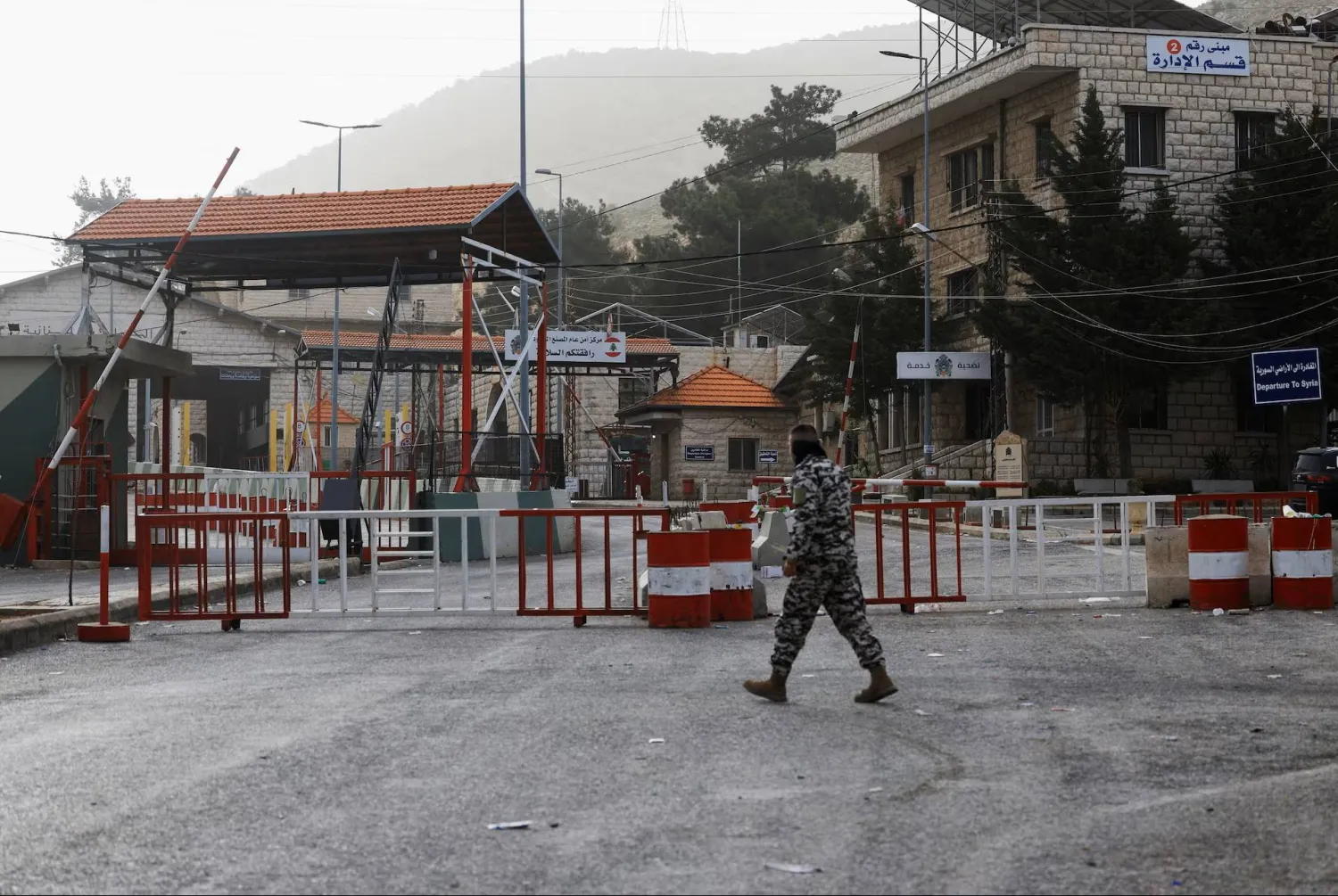A man walks near the closed Lebanese-Syrian border checkpoint amid escalating hostilities between Israel and Hezbollah, near Masnaa, Lebanon, April 5, 2026. (Reuters)