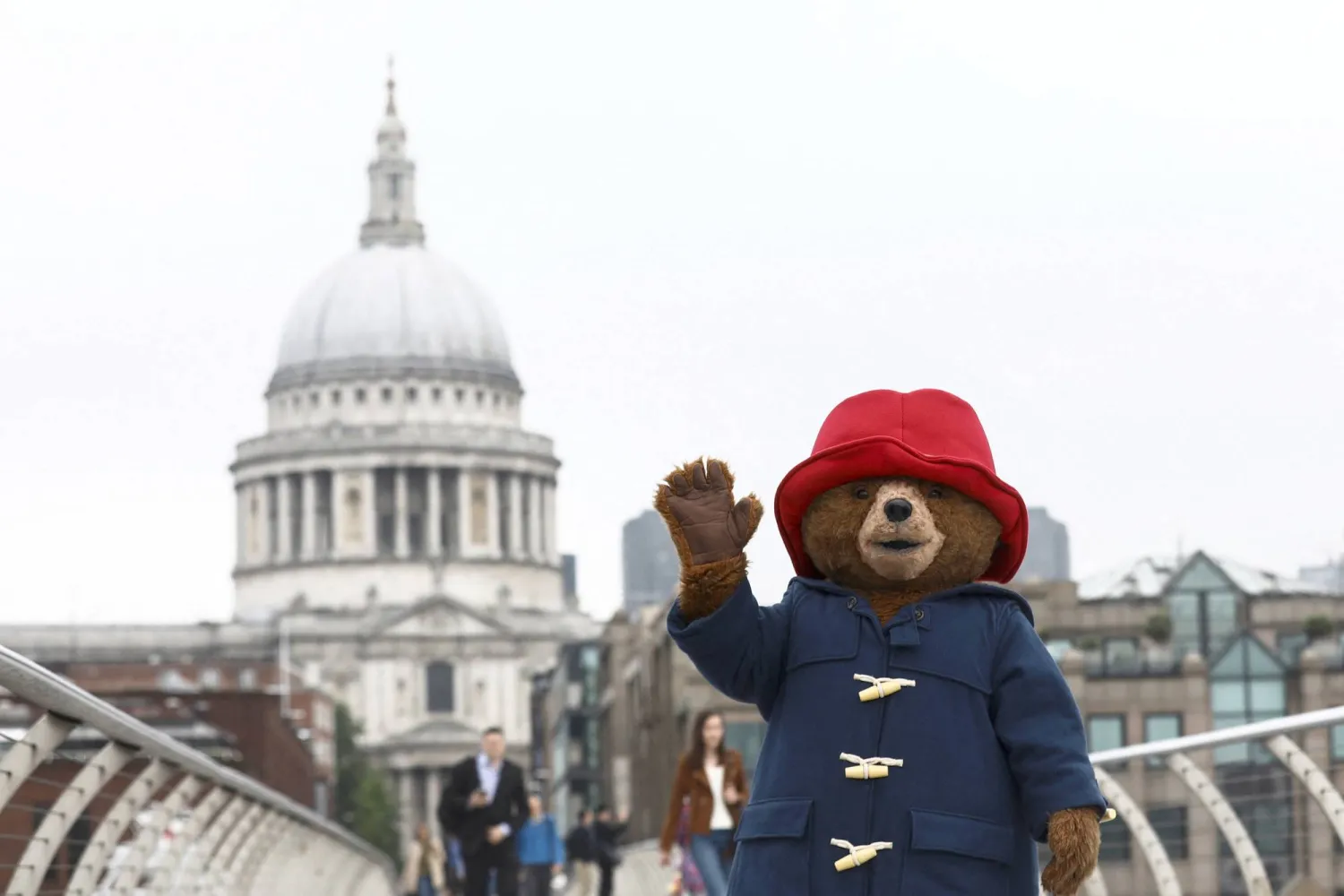 A performer wearing a Paddington Bear costume poses for photographers in front of St Paul's Cathedral in London, Britain, May 30, 2018. (Reuters)