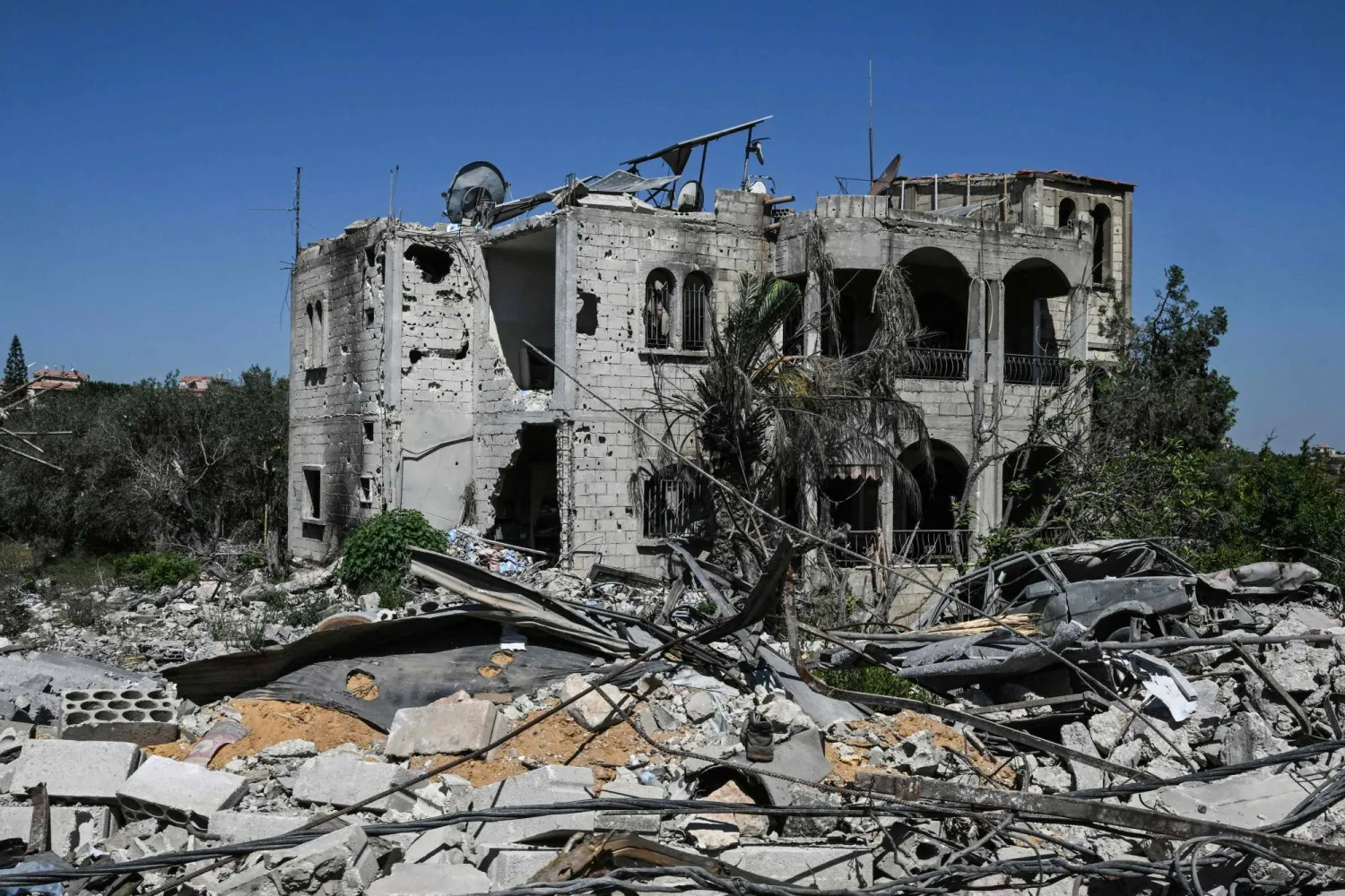 A photograph shows the damage in Zawtar al-Gharbieh on July 28, 2026, as residents return to inspect their homes after the Lebanese army deployed to the southern village as part of a framework deal reached with Israel. (AFP)