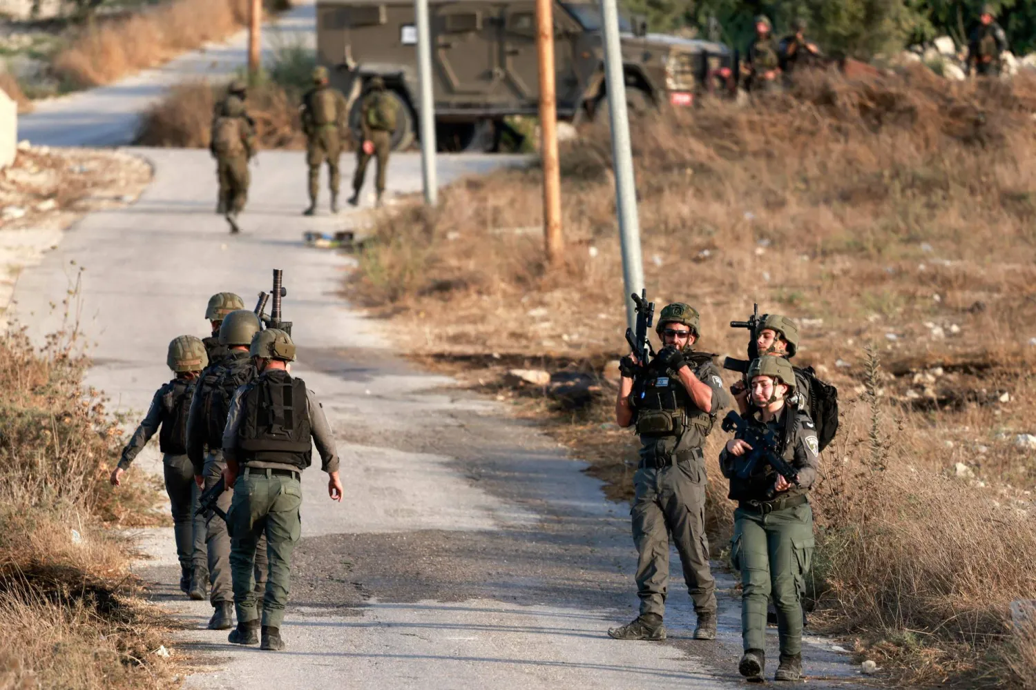 Israeli soldiers patrol the Palestinian village of Tell in the occupied West Bank on July 25, 2026 after Palestinians from the village clashed with Israeli settlers as they tried entering. (AFP)
