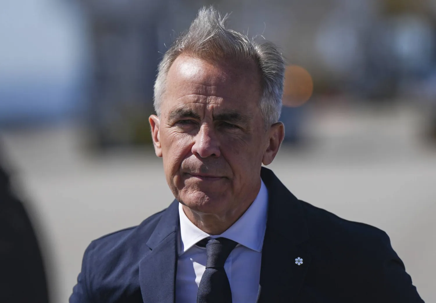 Canadian Prime Minister Mark Carney tours Global Container Terminals' Deltaport facility, at Roberts Bank in Delta, British Columbia, Thursday, July 30, 2026. (Darryl Dyck/The Canadian Press via AP)a