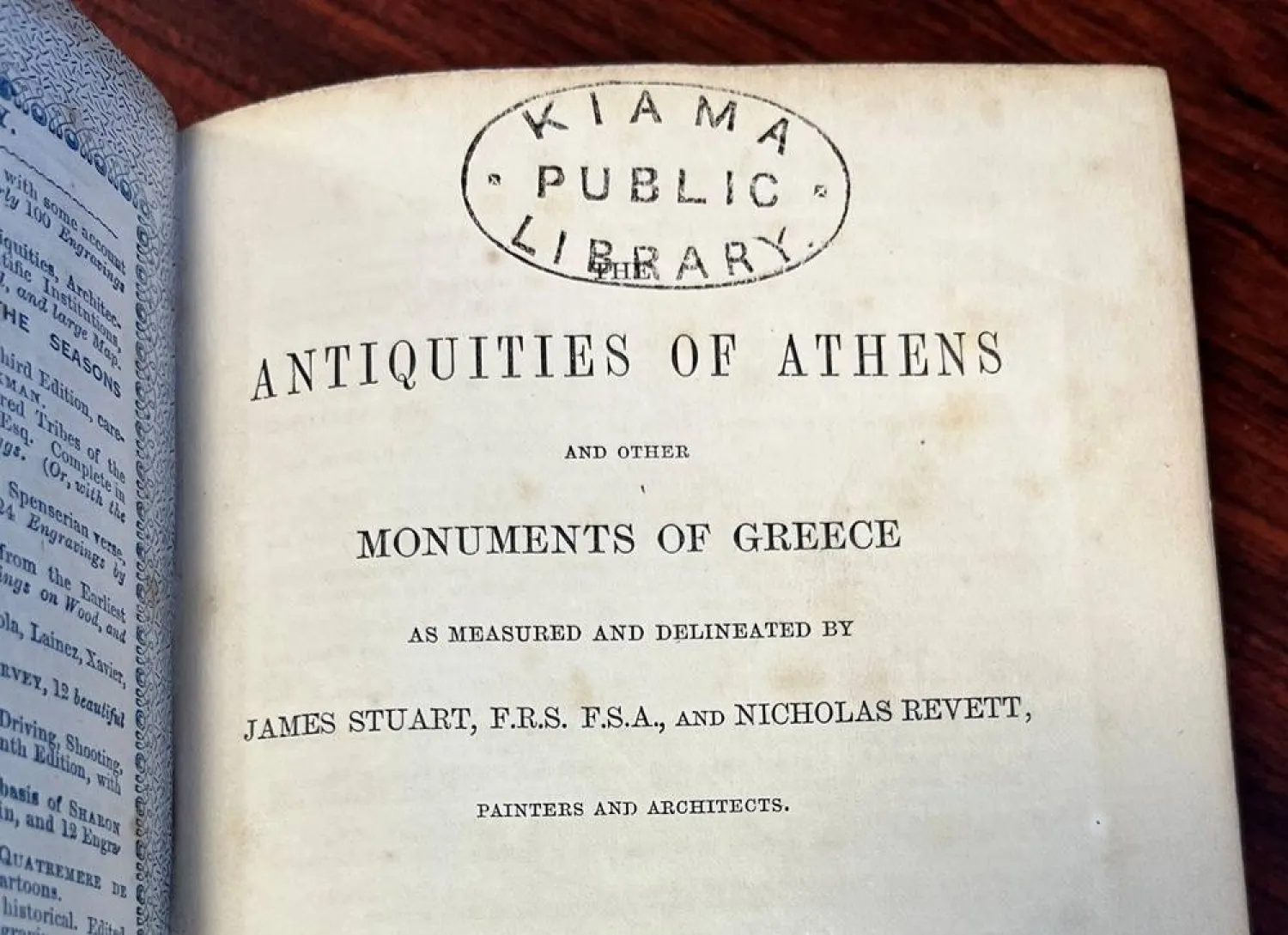  In this photo provided by Catherine Taylor a page of the book "Antiquities of Athens," stamped by a library, is shown on Thursday, July 30, 2026, after its return in Kiama, Australia, an estimated 150 years late. (Catherine Taylor via AP) 
