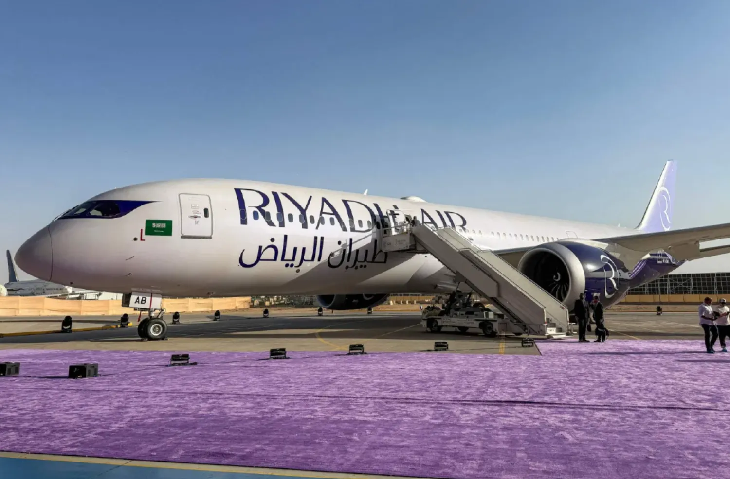 A Boeing 787-9 Dreamliner aircraft of Saudi airline Riyadh Air is pictured on the tarmac at King Khalid International Airport in Riyadh on June 7, 2026. (AFP)

