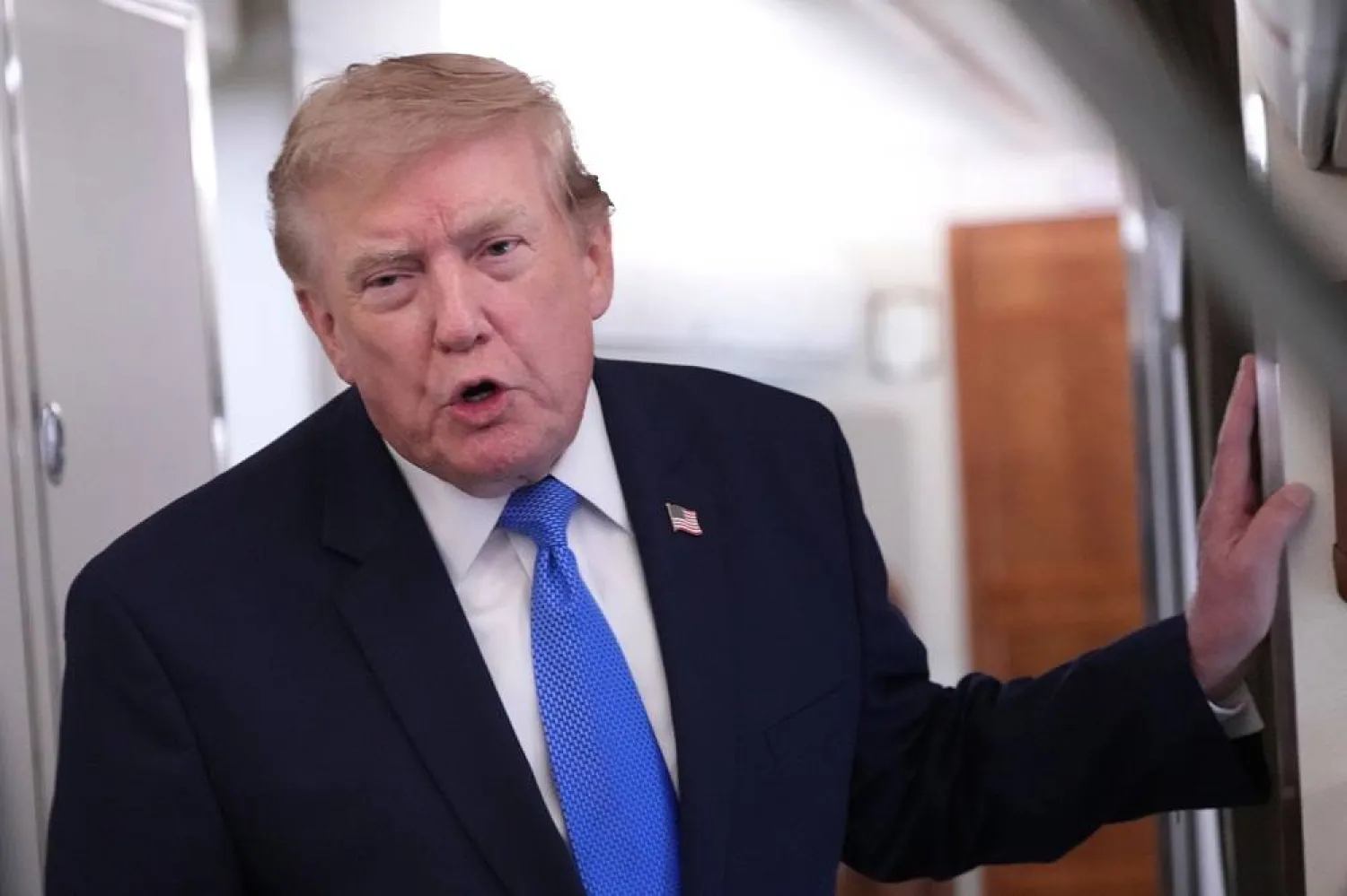  President Donald Trump speaks to reporters onboard Air Force One while returning to the White House, Sunday, Aug. 2, 2026. (AP) 