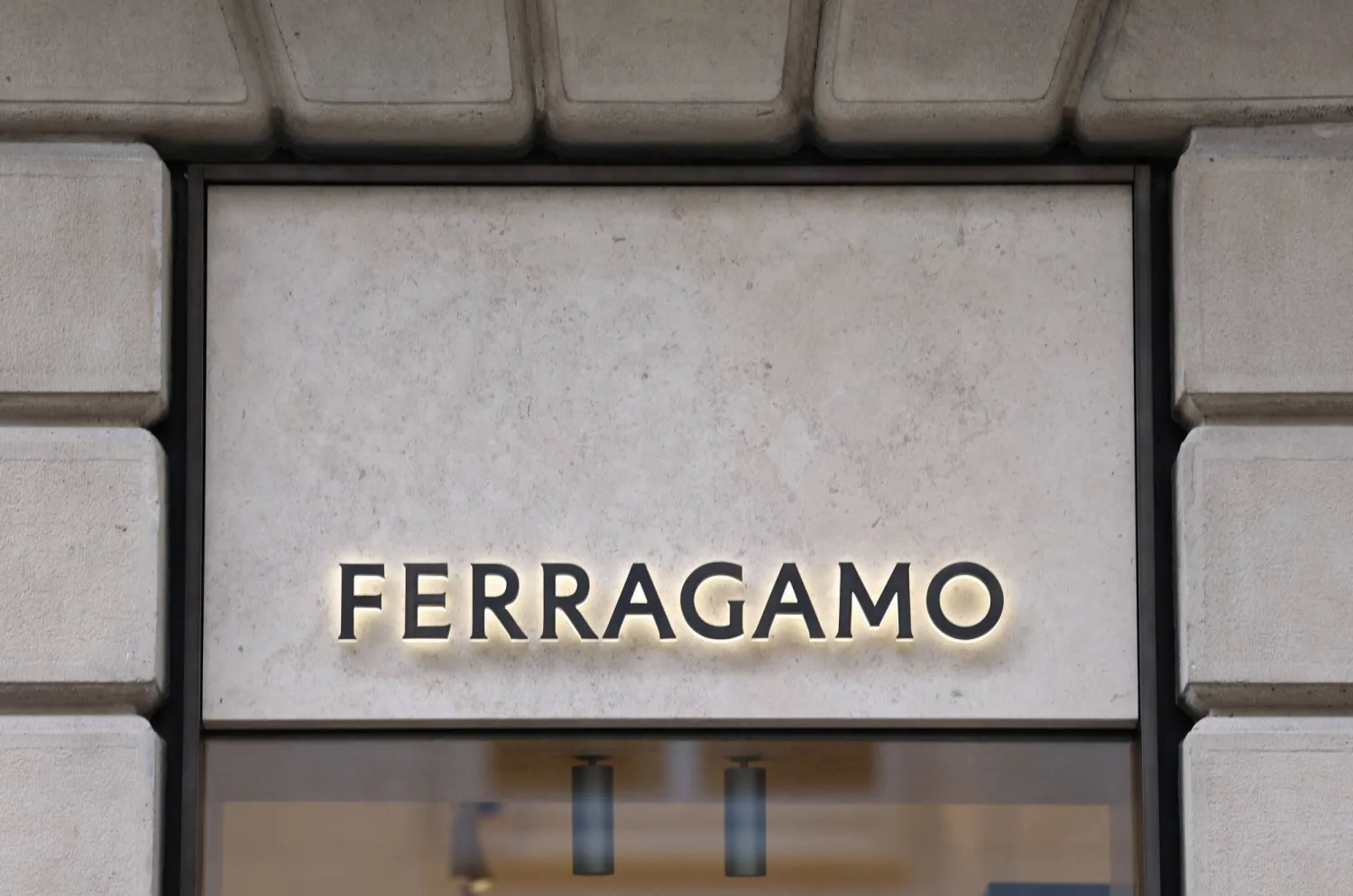A view of Italian luxury fashion house Salvatore Ferragamo's logo at a store in Milan, Italy, March 6, 2024. (Reuters)