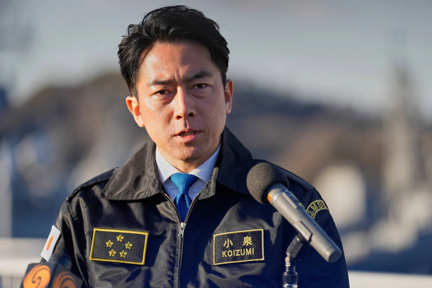FILE - Japan's Defense Minister Shinjiro Koizumi speaks with the media after meeting with South Korea's Defense Minister Ahn Gyu-back at the headquarters of the Japan Maritime Self-Defense Force Yokosuka District, south of Tokyo, on Friday, Jan. 30, 2026. (AP Photo/Eugene Hoshiko, File)