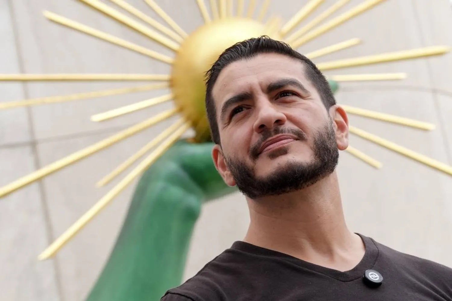 Abdul El-Sayed, a progressive candidate in the Democratic primary for US Senate in Michigan, attends a news conference at the Spirit of Detroit following the March of the Many, Sunday, Aug. 2, 2026, in Detroit. (AP)