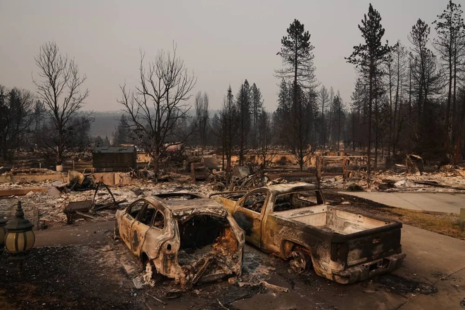  Dozens of homes are seen burned to the ground after a wildfire hit the northern part of Spokane, Wash., Monday, Aug. 3, 2026. (AP)