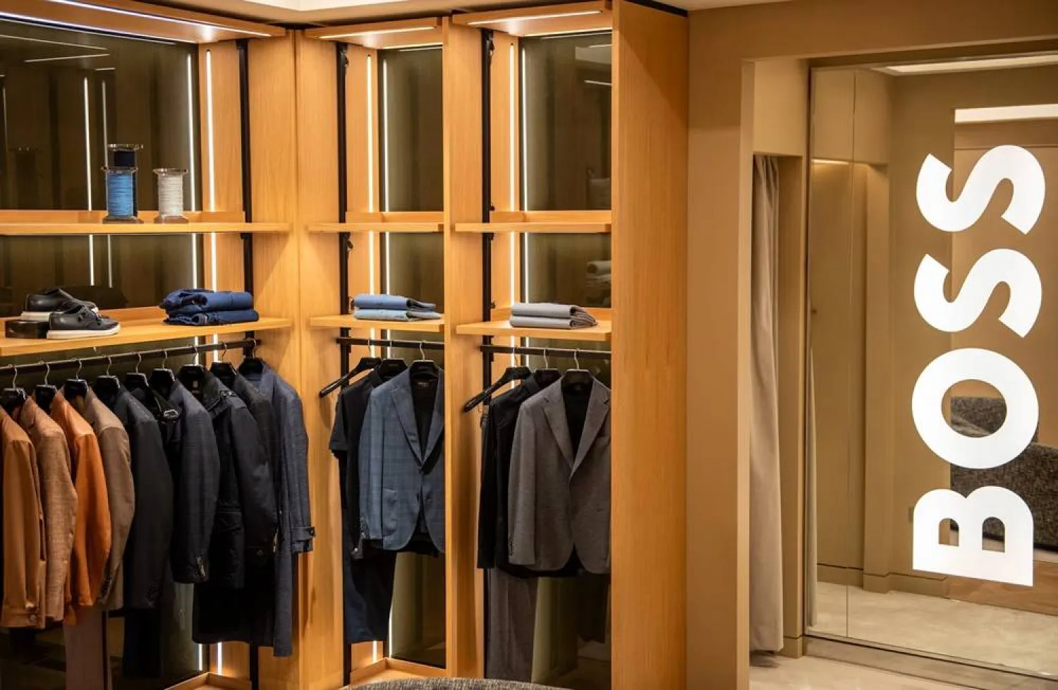 Mens clothing are on display at the Boss store in London, Britain, May 30, 2024. (Reuters) 