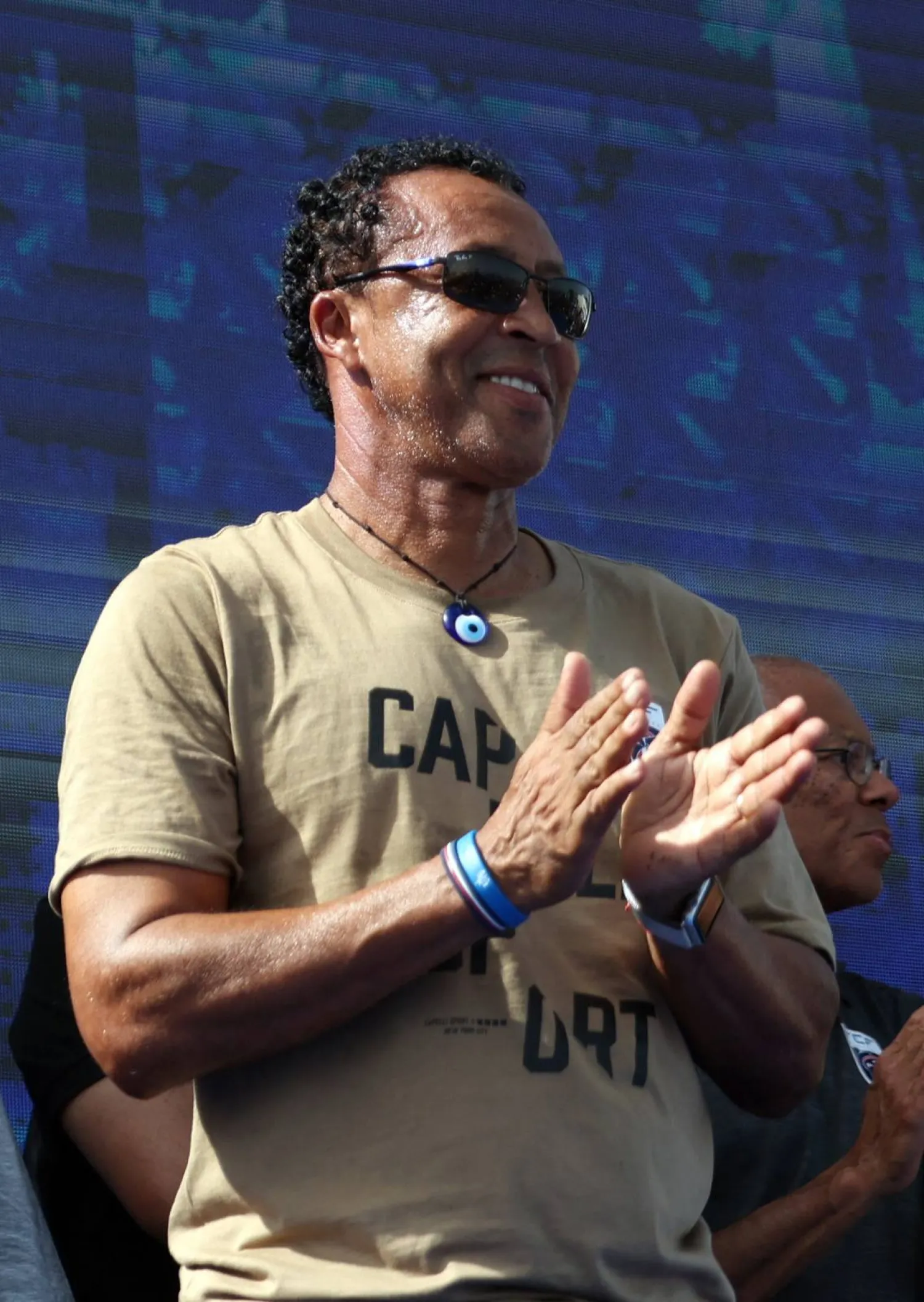 Soccer Football - FIFA World Cup 2026 - Cape Verde arrive home in Praia - Praia, Cape Verde - July 5, 2026 Cape Verde coach Bubista celebrates with players and fans after arriving from the United States REUTERS/Sodiq Adelakun